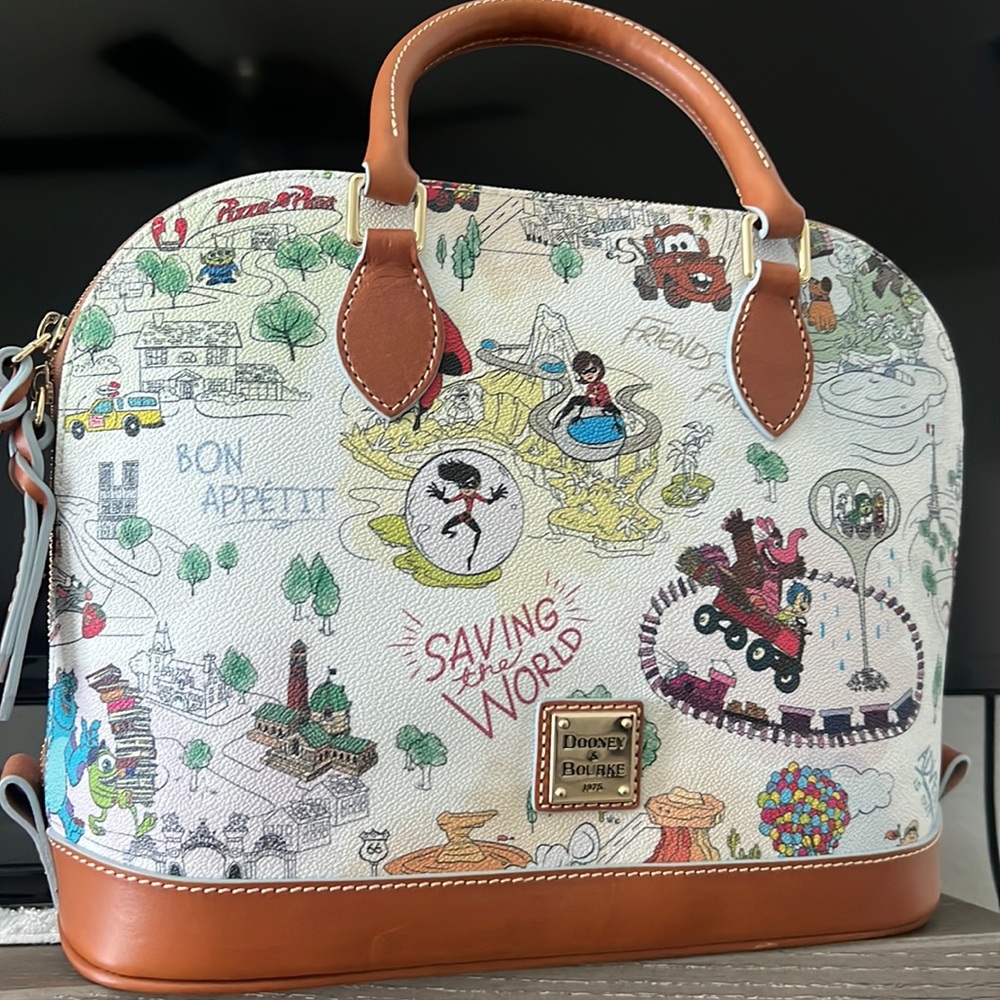 Disney heroes exclusive Dooney authentic beautiful for every day magic